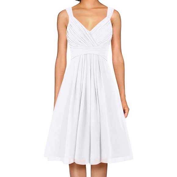 Dresses & Skirts - NWT White Wedding dress. Short ,flowy, lace up back, lined with built in bra.